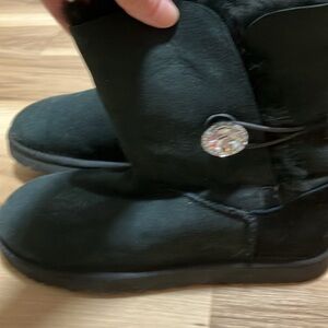 UGG Black Winter Boots with diamond closure.